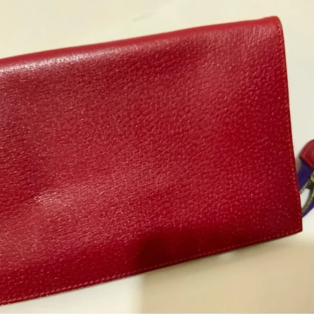 NWOT Aspinal of London red reptile cosmetic case.
